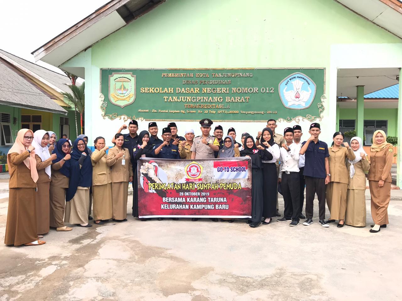 Katar Kampung Baru Jadi Petugas Upacara Sumpah Pemuda di SDN 012.