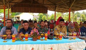 Tampak Babinsa Gunung Putri Serda Muchadlir saat menghadiri acara pisah sambut pengajar muda di Kecamatan Bunguran Batubi.
