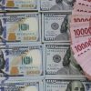 Rupiah Tembus Rp18.000 per Dolar AS, Ekonom Minta Masyarakat Perkuat Ketahanan Keuangan Keluarga